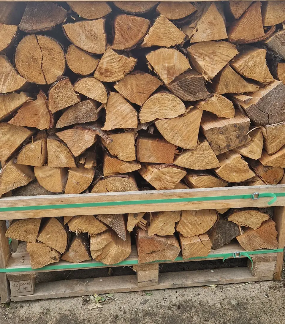 A crate of split logs ready for delivery from Moray Logs